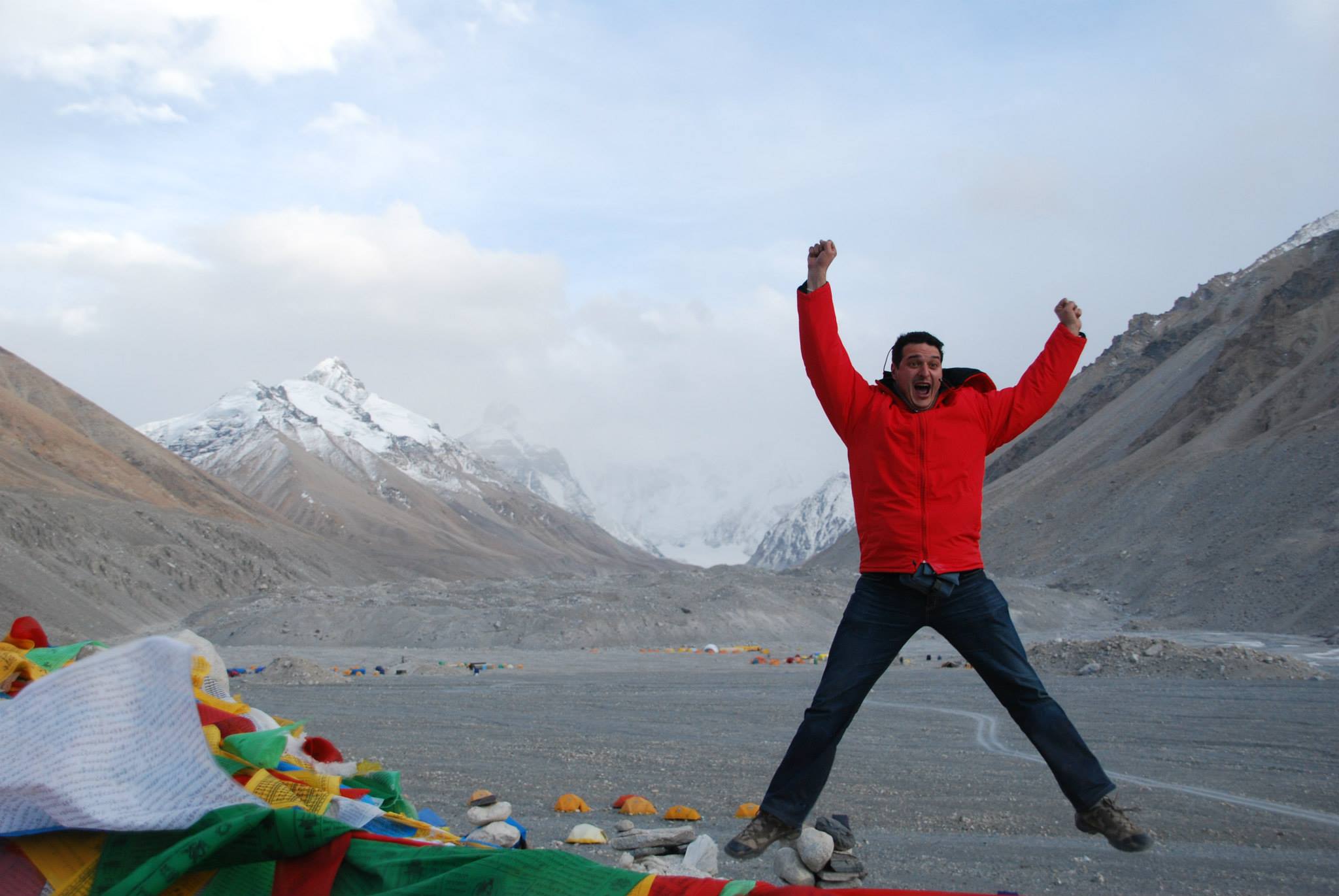 Julian Martin at Everest Base Camp with the summit visible